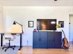 Office space featuring light hardwood / wood-style flooring