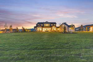 View of front of house with a yard