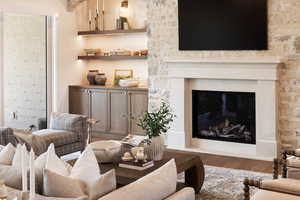 Living room with dark hardwood / wood-style floors