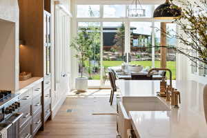 Interior space featuring a chandelier and sink