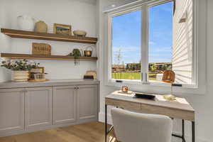 Office featuring light hardwood / wood-style floors