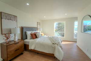 Bedroom with light wood-type flooring