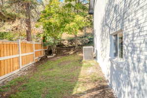 View of yard featuring central AC