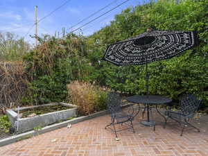 View of patio / terrace with fish pond.