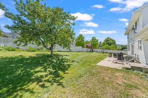 View of yard featuring a playground, central AC, and a patio