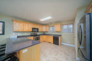 Kitchen with included appliances and pantry