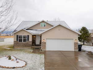 View of front of home featuring a garage