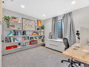 View of carpeted home office