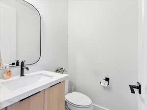 Bathroom with vanity and toilet