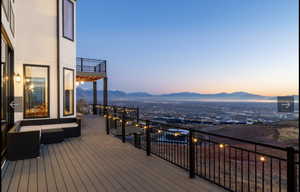 Deck at dusk with a mountain view