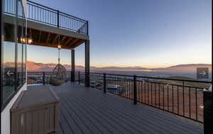 Deck at dusk with a mountain view