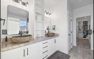 Bathroom featuring hardwood / wood-style floors and vanity