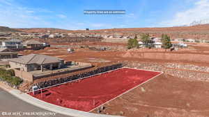 Birds eye view of property featuring a mountain view