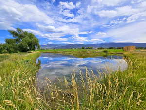 Property view of water with a mountain view