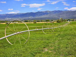 Property view of mountains with a rural view