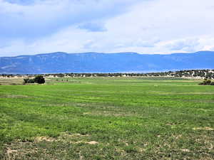 View of mountain feature with a rural view