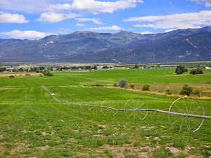 Property view of mountains with a rural view