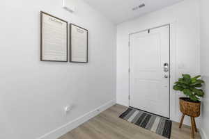 Entryway featuring light hardwood / wood-style flooring