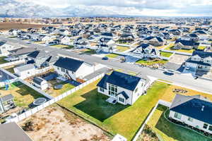 Birds eye view of property with a mountain view