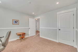 View of carpeted home office