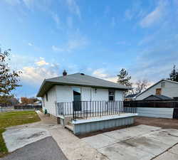 Back of property with a patio