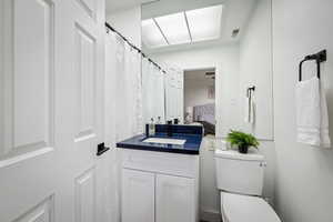 Bathroom with vanity and toilet