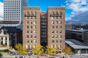 View of building exterior featuring a mountain view