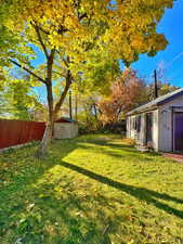 View of yard featuring a storage shed