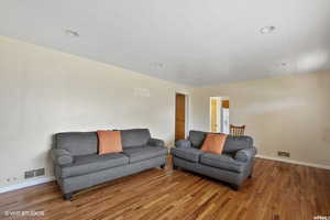 Living room featuring hardwood / wood-style floors