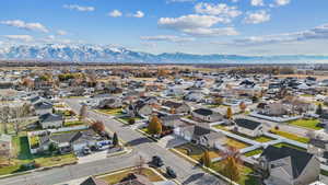 Birds eye view of property with a mountain view