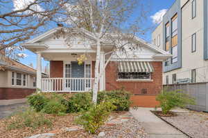 Bungalow featuring a porch