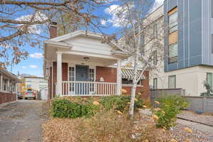 View of front of property featuring covered porch