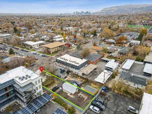 Birds eye view of property featuring a mountain view