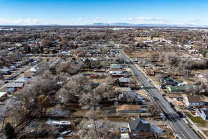 Birds eye view of property with a mountain view