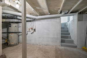 Basement with strapped water heater