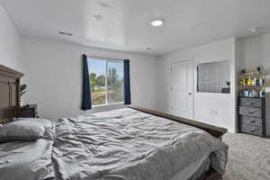 Bedroom featuring carpet flooring