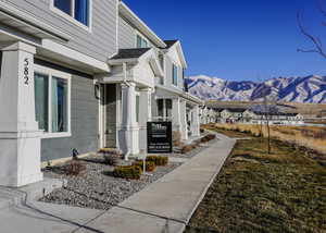 Surrounding community featuring a mountain view