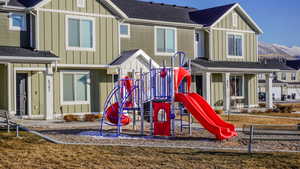 View of play area with a mountain view