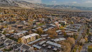 Birds eye view of property with a mountain view