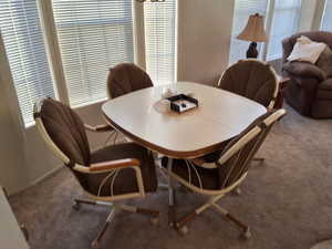 View of carpeted dining space