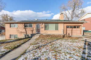 View of front of home with a garage