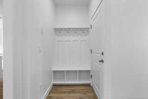 Mudroom with dark hardwood / wood-style floors