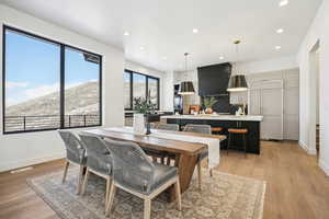 Dining area featuring light wood-type flooring