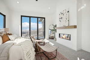 Carpeted bedroom featuring a mountain view