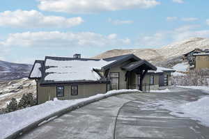 View of front of property featuring a mountain view