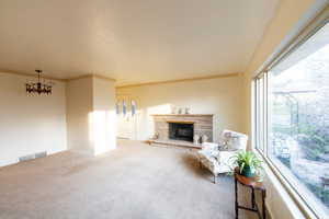 Sitting room featuring a fireplace