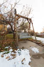 View of yard layered in snow