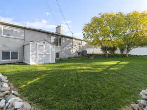 View of yard with a shed