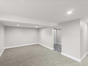 Basement featuring carpet floors