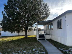 View of yard featuring a wooden deck